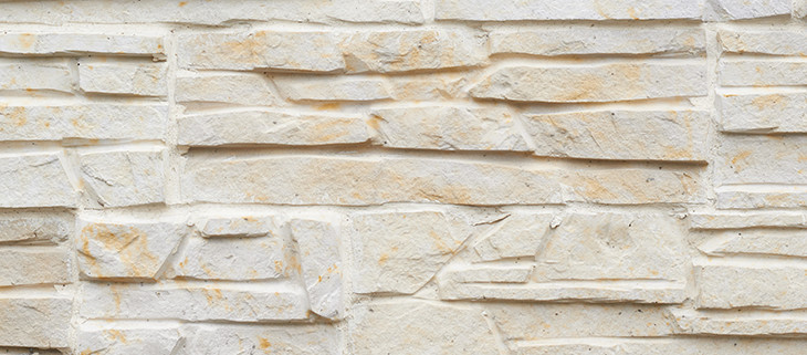 Wall of limestone bricks