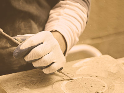 man-making-design-in-stone