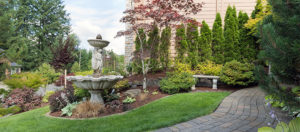 nicely-landscape-front-yard-with-fountain